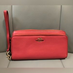 Coach long zip around wallet in red with gold-tone hardware